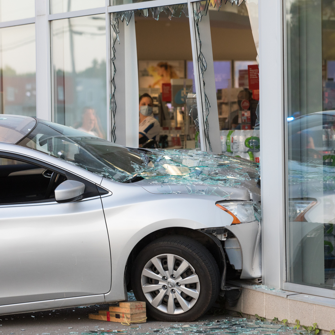 car accident into building