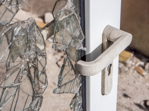 door broken by police during entry